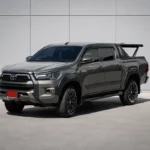 Front side view of Toyota Hilux Revo with automatic trunk lid
