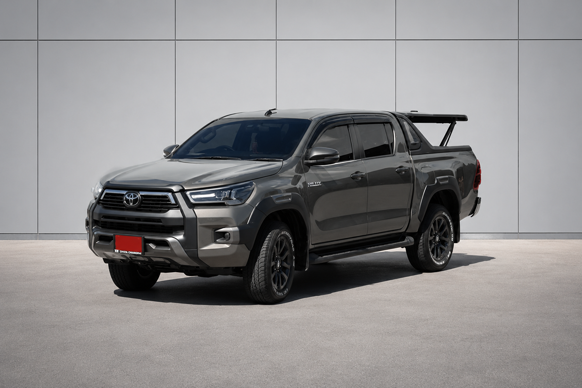 Front side view of Toyota Hilux Revo with automatic trunk lid