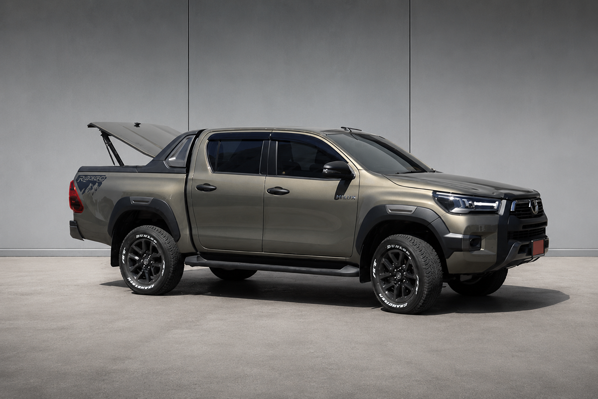 Side view of Hilux Revo with Carryboy imported trunk lid