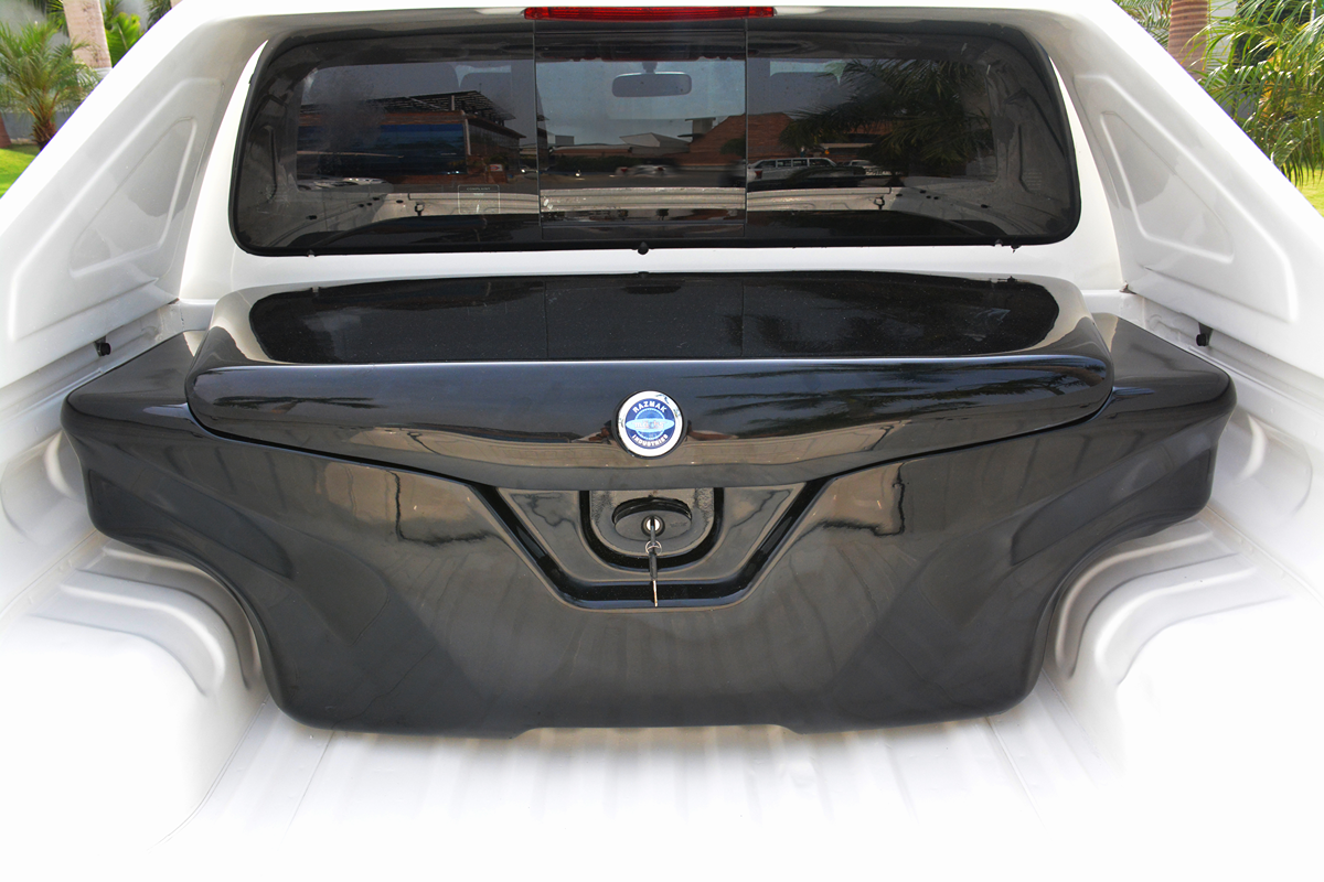 Premium black fiberglass luggage box installed in pickup bed by MARKS Pakistan